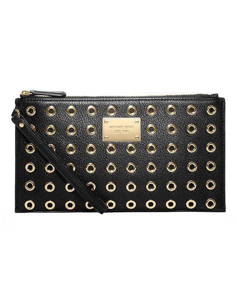 michael michael kors jet set grommet large key pouch|michael michael kors jet set grommet large zip clutch black.